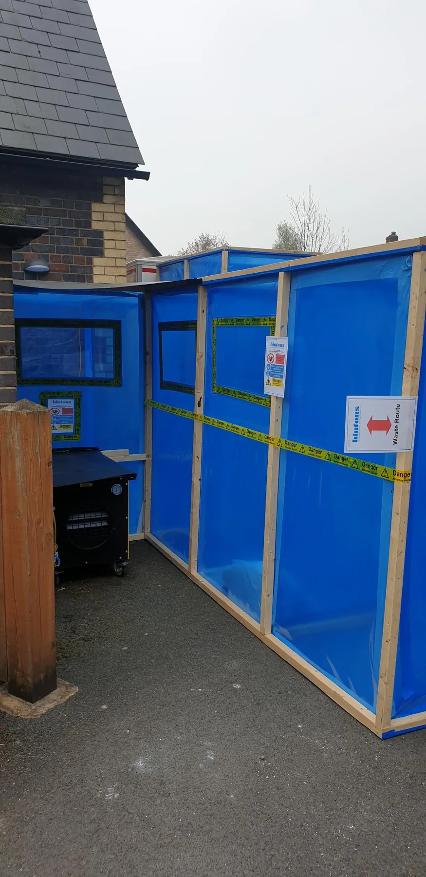Hintons asbestos enclosure for licensed thermal insulation residue removal in Worcester