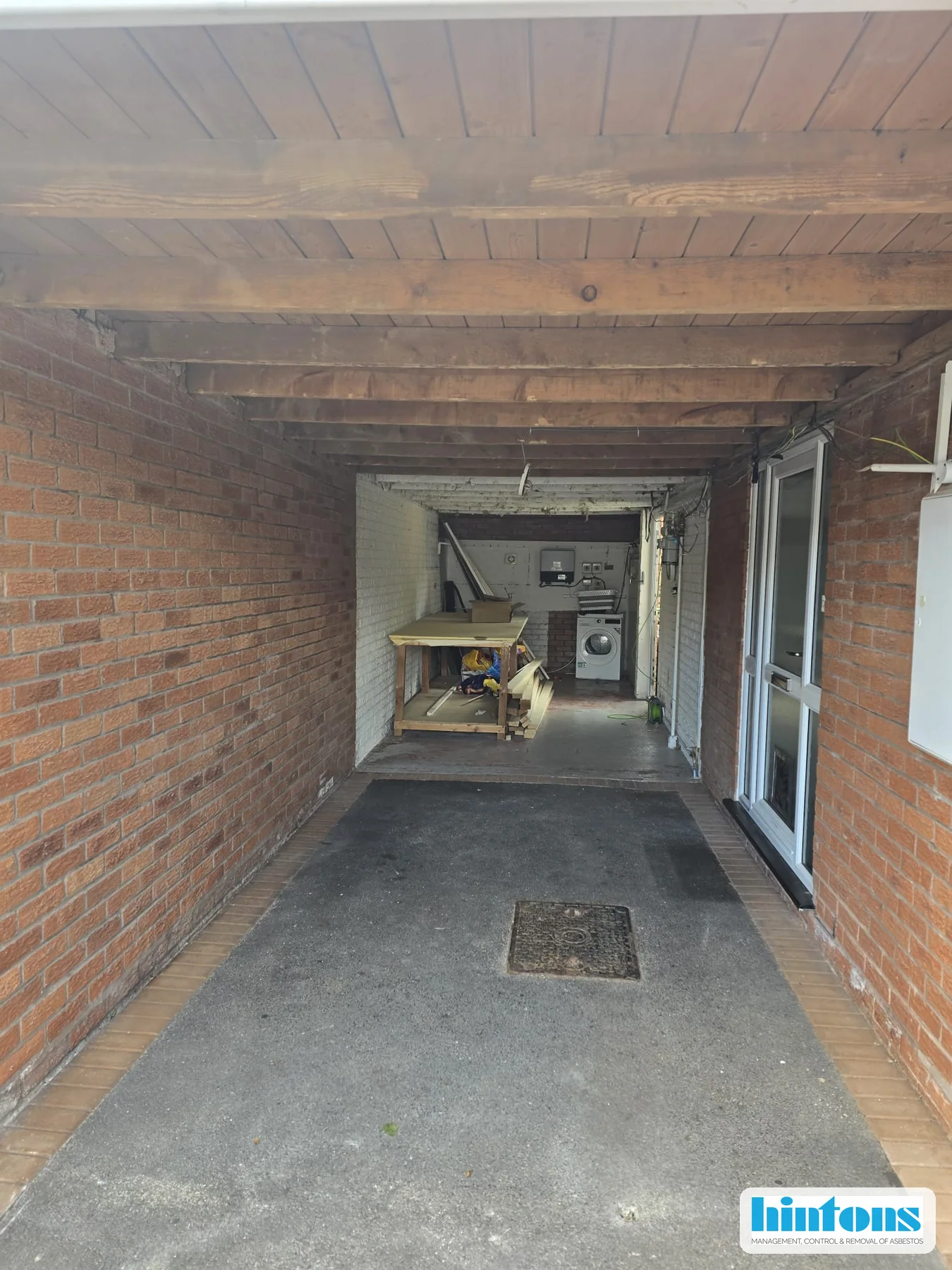 Carport area following licensed asbestos insulation board ceiling removal in Cannock