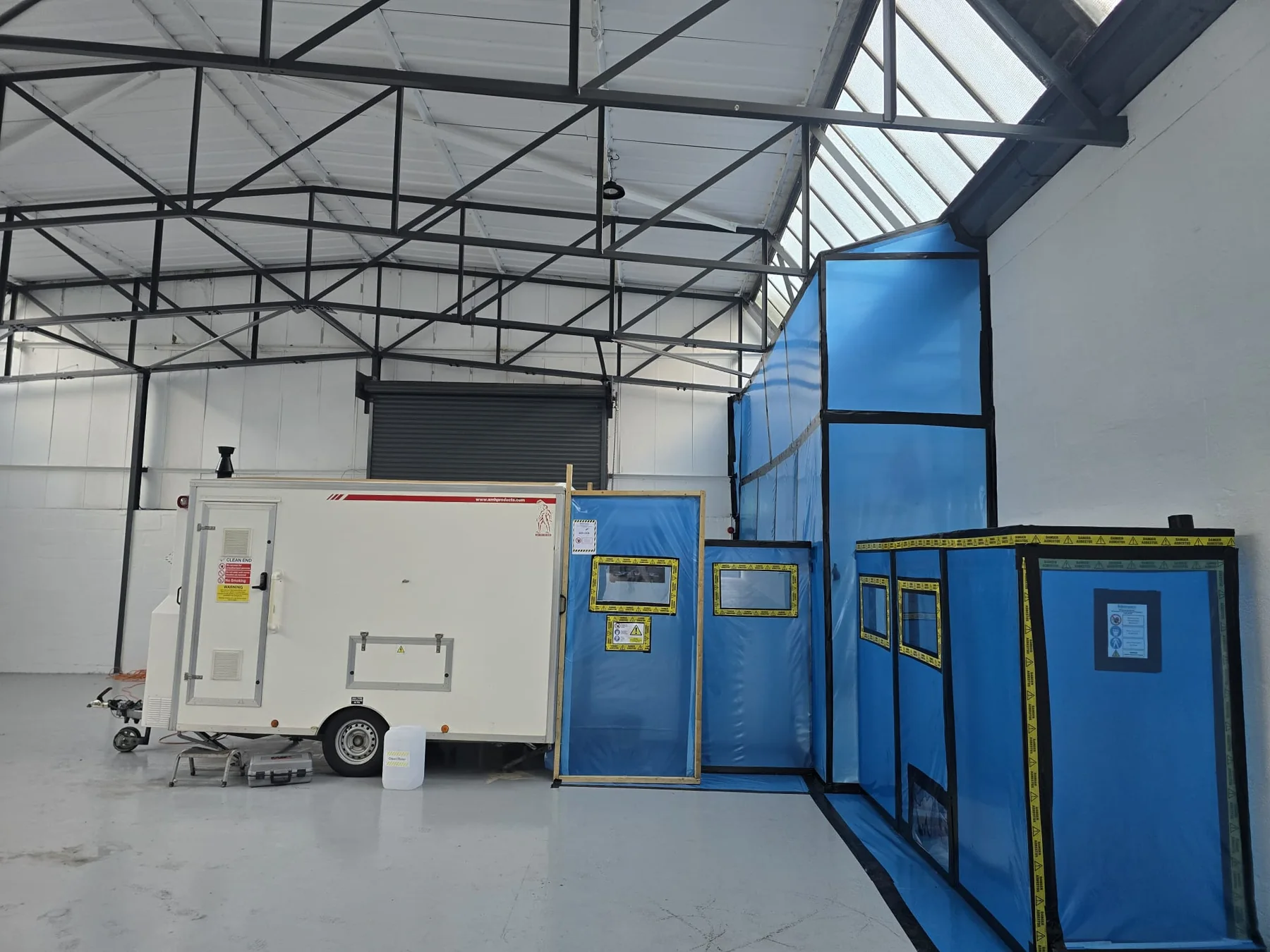 Hintons licensed asbestos enclosure for AIB boxing removal around RSJs in Telford